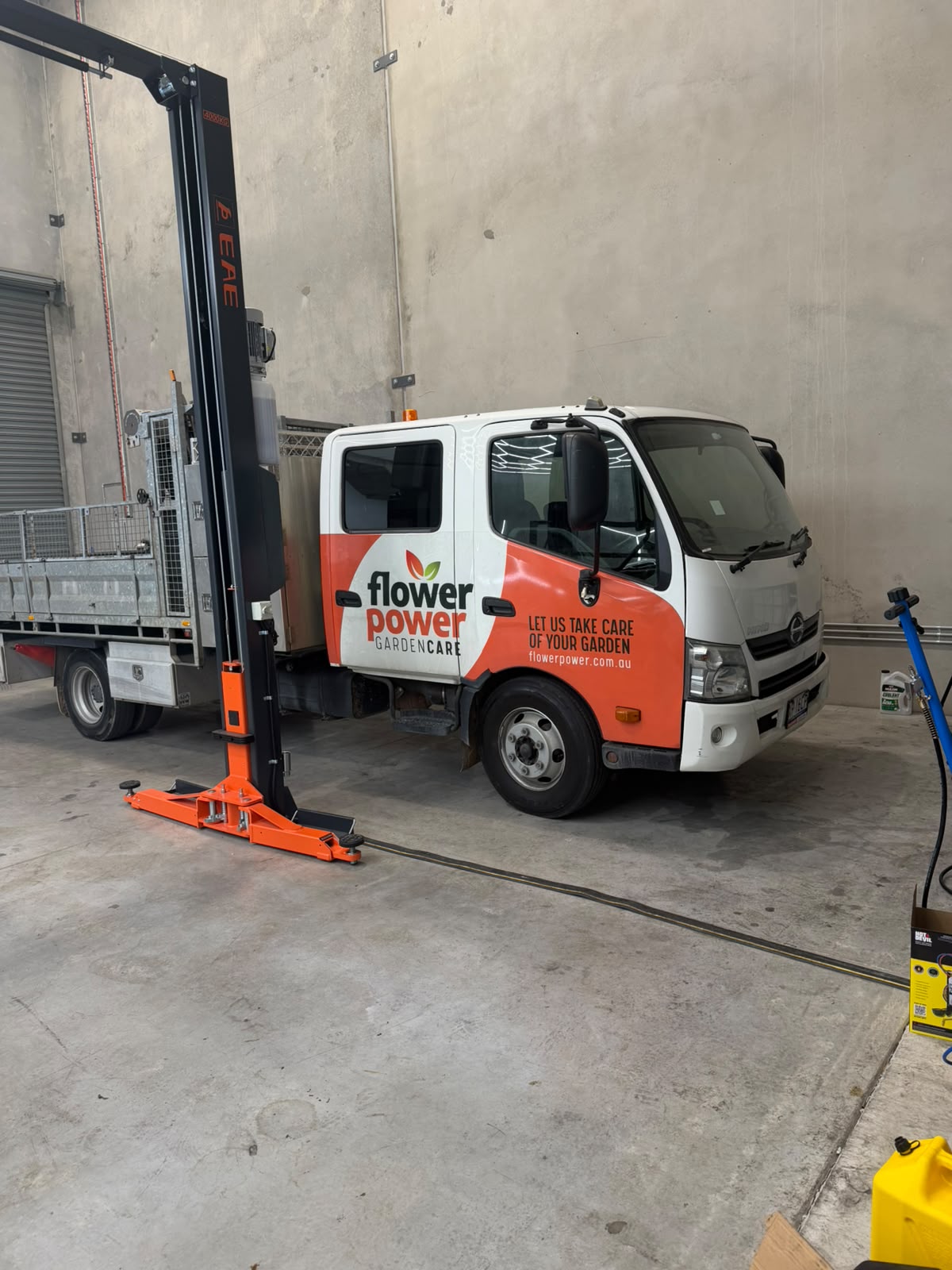 Hino light truck on the two-post hoist
